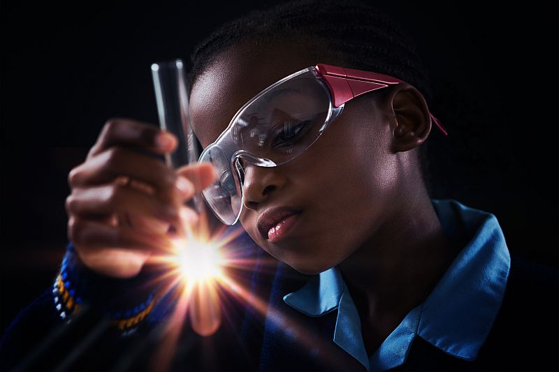 Black student doing experiment