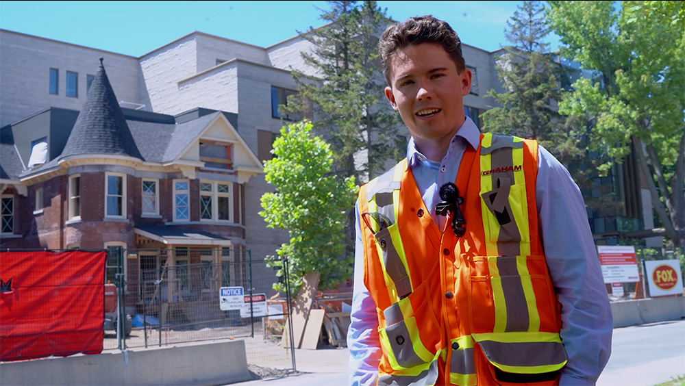 Rylan Richter in front of construction site