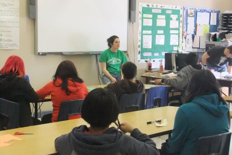 students listening to a speaker