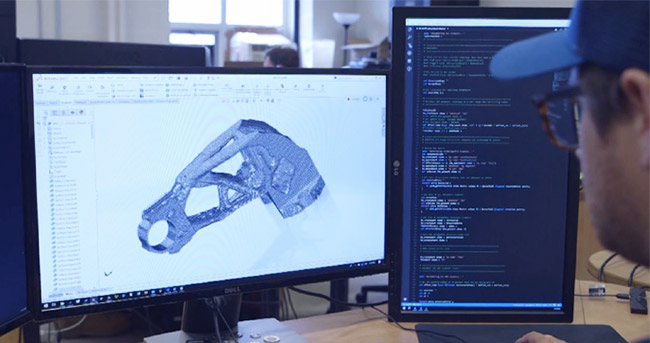 A researcher designs a part for Design for Additive Manufacturing (DfAM)